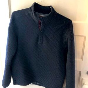 Rhone quilted pullover with snapping buttons. Navy blue. Size Medium.